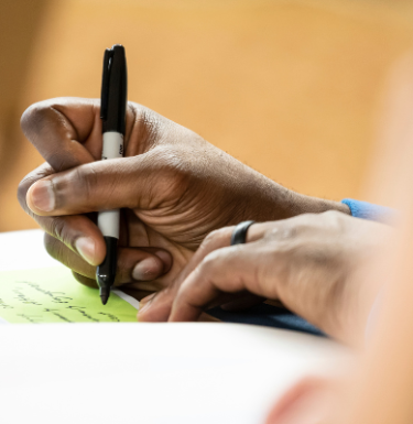 person writing things down