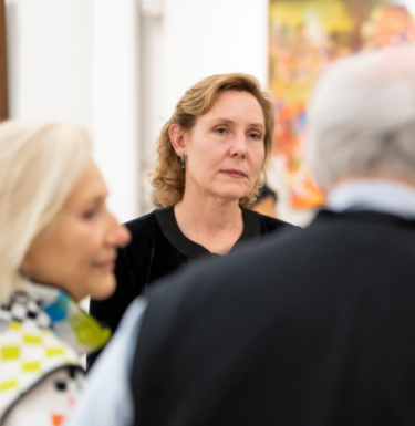 woman talking to people