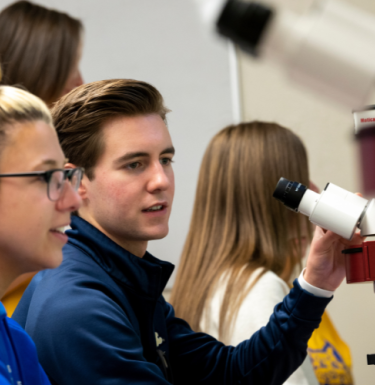 Pitt Greensburg students using microscope