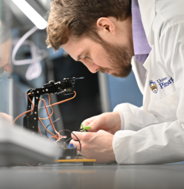 person working on invention