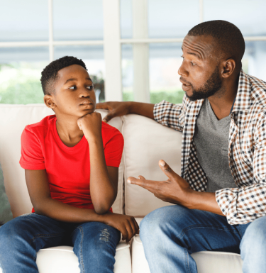 dad sitting with son